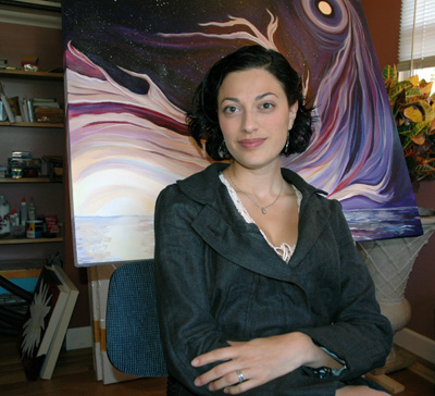 Artist Cedar Lee in her painting studio with one of her "Cosmic Dance" paintings, Baltimore, MD studio