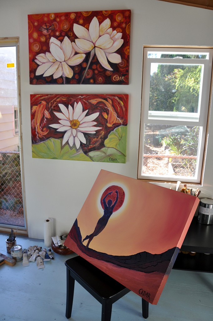 Paintings in Cedar Lee studio. Top to bottom: Dragonfly's Discovery, Koi Circles, Corona.