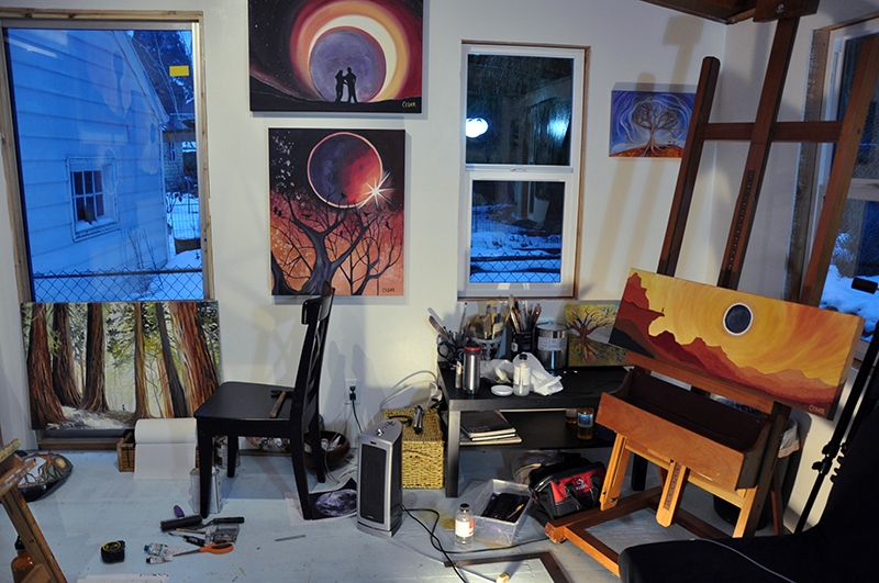 Cedar Lee paintings in art studio