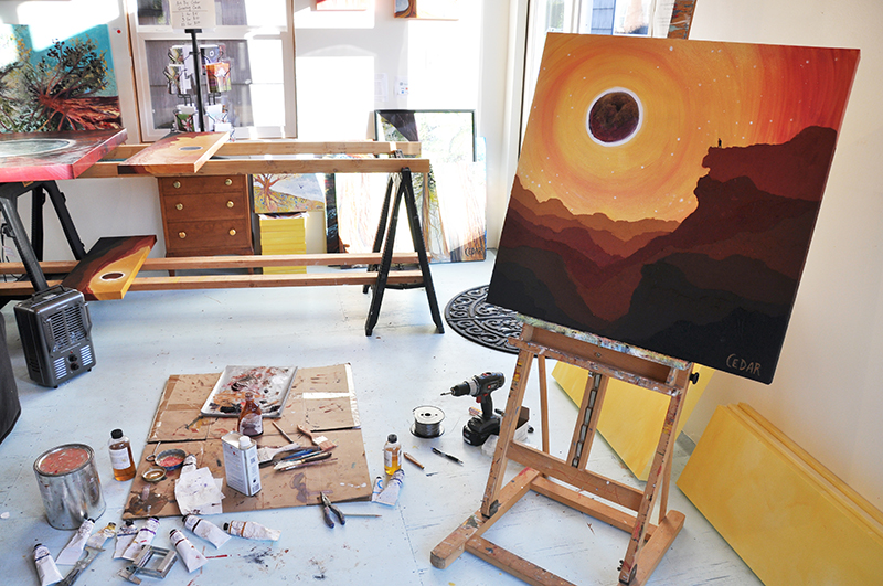 Art Studio of Cedar Lee. On easel: Eclipse Day Climber. 30" x 30", Oil on Canvas, © 2017 Cedar Lee