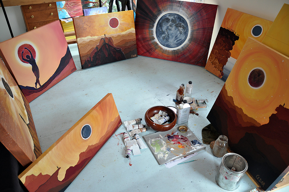 Eclipse paintings in Cedar Lee art studio