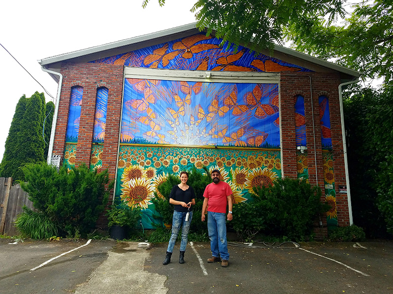 Cedar Lee (left) and Hector Hernandez (right) with Monarca Mural in Portland, OR