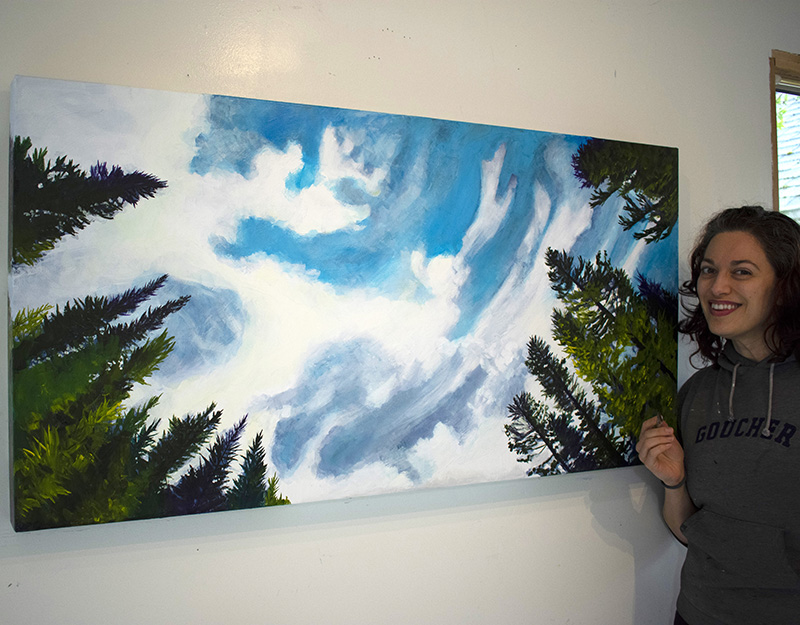 Painting by Cedar Lee of clouds floating in a blue sky over evergreen trees.