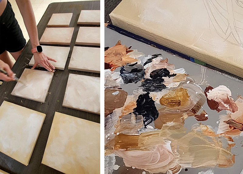 Cedar Lee working on many small canvases in her painting studio during her artist residency at Mauser Ecohouse in Costa Rica. Paint palette shows a mix of warm brown colors.