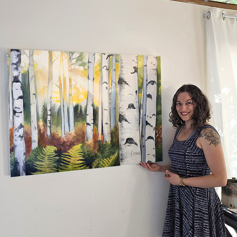 Artist with painting: Birch Forest Sunbeams. © 2025 Cedar Lee
